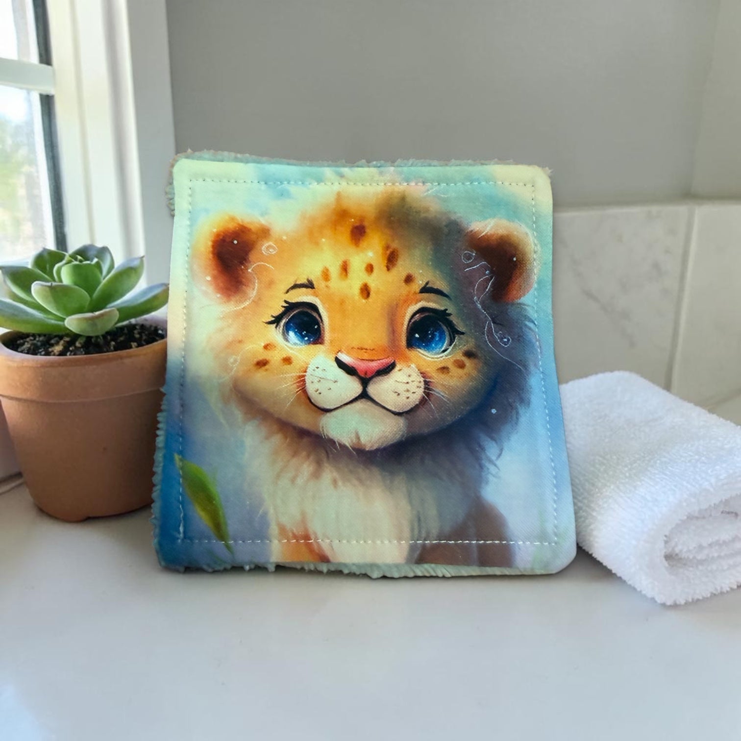 Lingette démaquillante Lion fond bleu